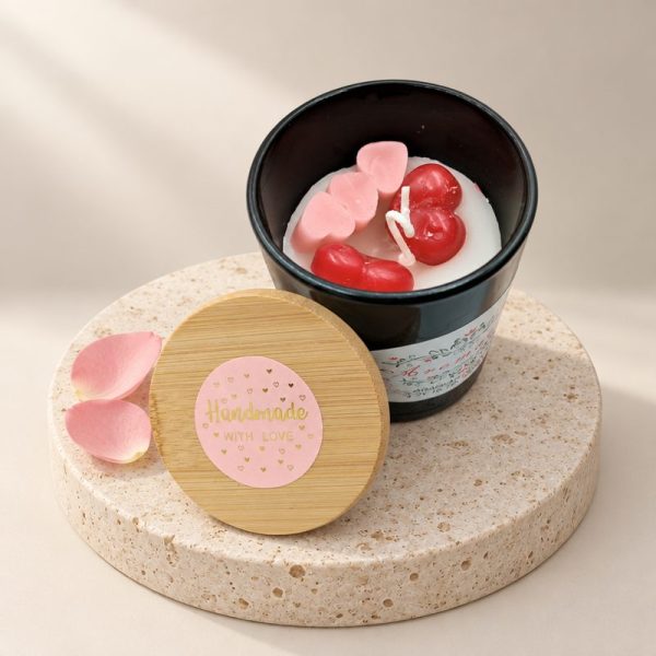 Scented Candle with hearts in black glass