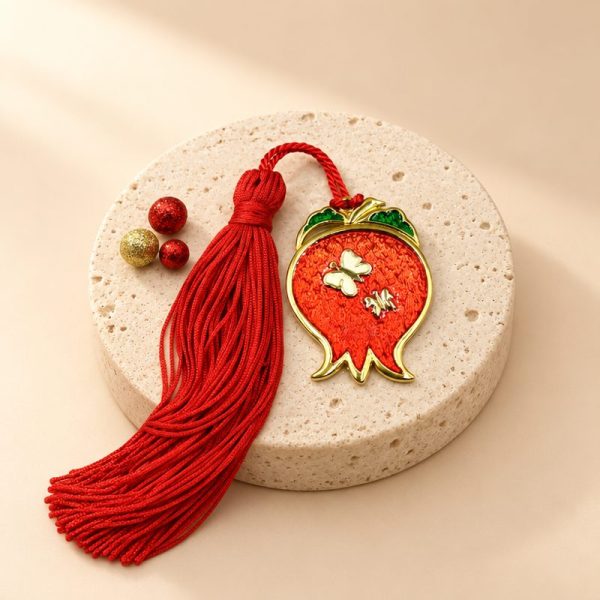 Lucky Charm pomegranate with enamel and red tassel