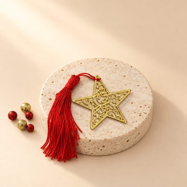 Lucky Charm star gold with red tassel